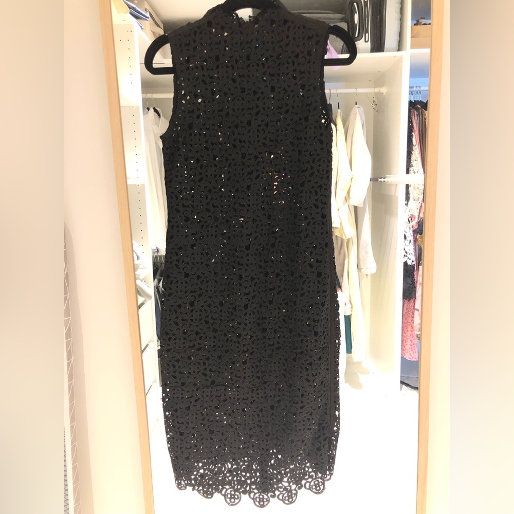 Guipure lace midi dress with high neck. High quality fabric.